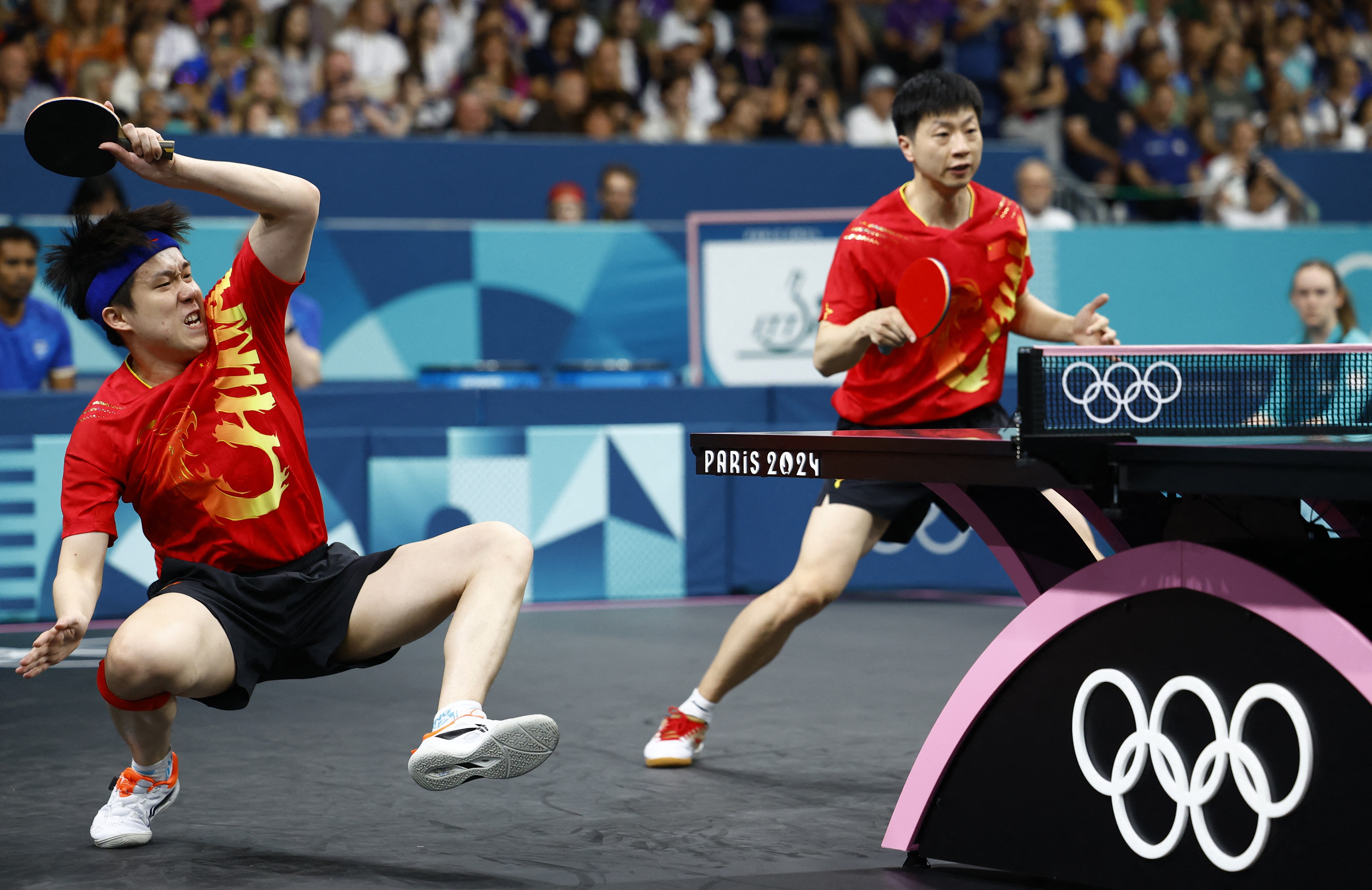 关于中国乒乓球队完胜比利时乒乓球队，马龙完成帽子戏法的信息